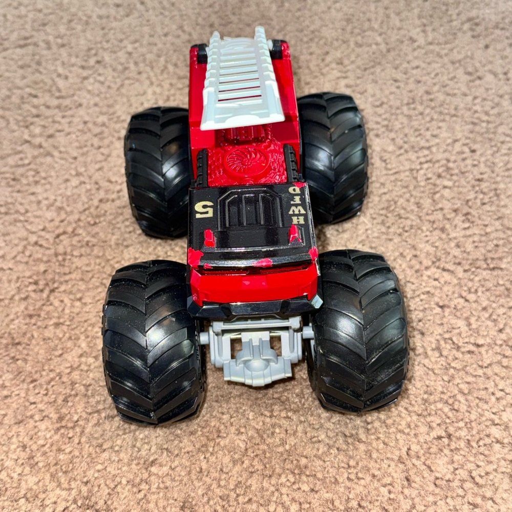 Hot Wheels Red Monster Fire Rescue Truck with White Ladder - Picture 3 of 3